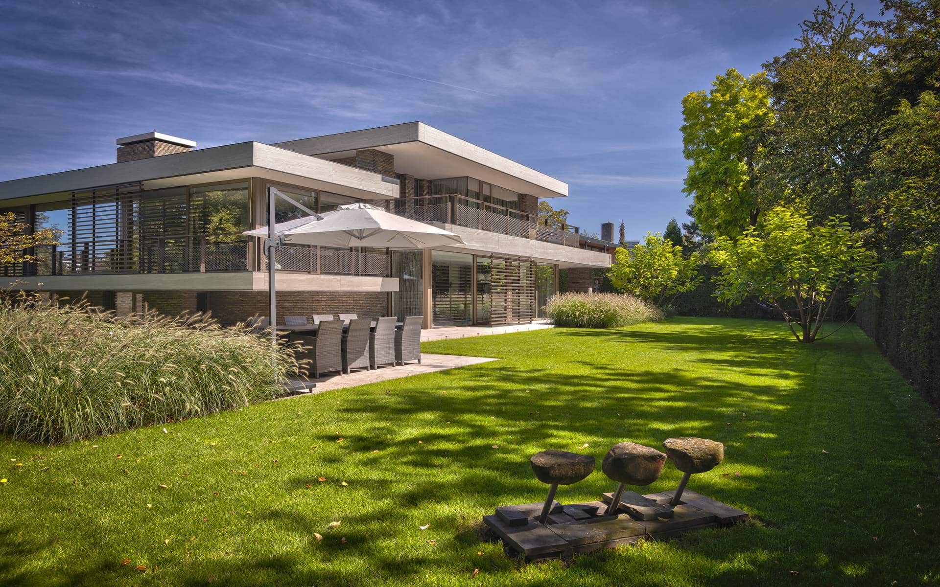 Villa in het groen: moderne tuinarchitectuur